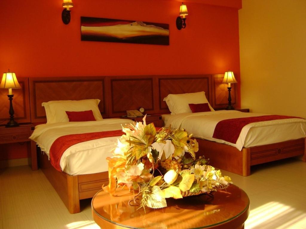 La Rosa Hotel By Brother International Mascate Quarto foto
